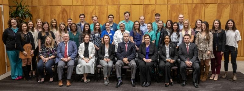 Group shot of faculty and students honored as 2019-2020 Phi Kappa Phi Initiates at UMMC